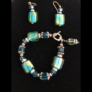 Swarovski and glass beads royal, green and golden.